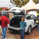The day buzzed with activity as people flocked to check out the showcased electric vehicles..